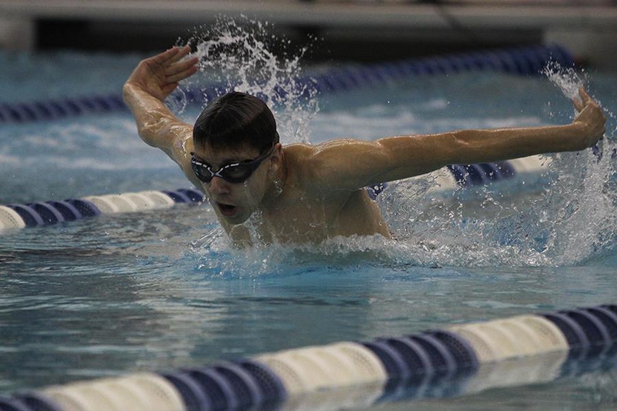 Sam Ruzga (12) competes in the butterfly. This was Ruzga’s first year on the swim team.
