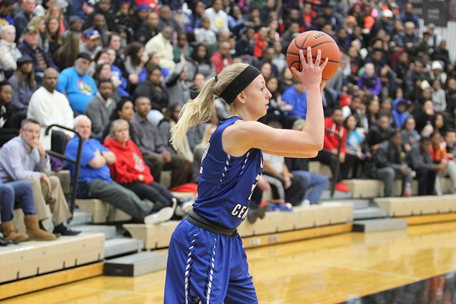 Rachel Robards (11) plays the ball inbound from the sidelines. The score at halftime was 24-23, Lake Central down by one.
