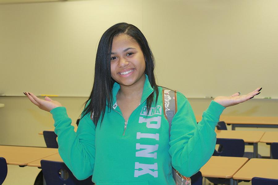 Aniyah Thompkins (9) is posing for a picture at a Freshman Class Cabinet meeting. They discussed how they would organize the next Freshman Rush.