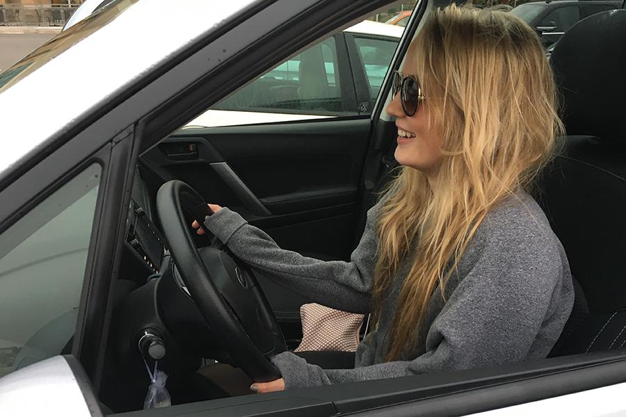 Katherine Karl (10) drives around town in her car. Karl got her license on March 7.