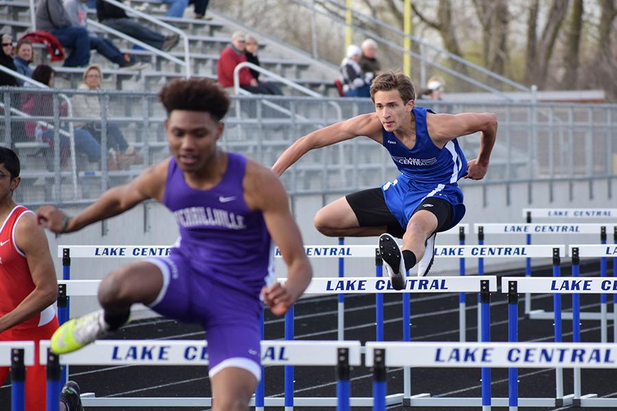 Caleb Pisowicz (11) competes during a hurdle event during a track meet at home. This was Pisowicz’s first year competing in varsity hurdle events.
