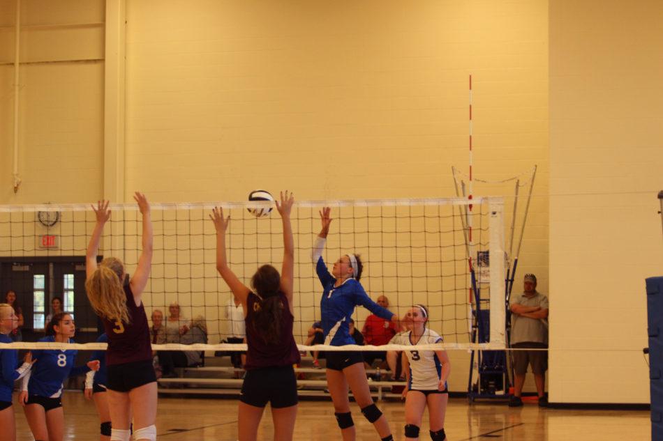 Katharine+Mahoney+%289%29+is+setting+up+another+teammate+for+a+spike.++She+played+the+outside+position+during+the+game.
