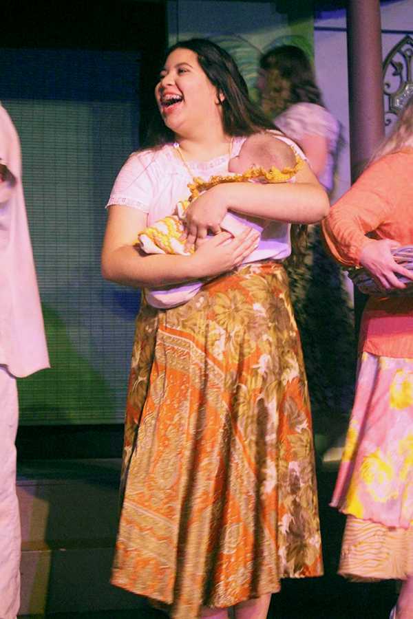 Ava Solis (10) in the musical “Once on this Island”. She was singing during the opening. Photo By: Olivia Throckmartin 