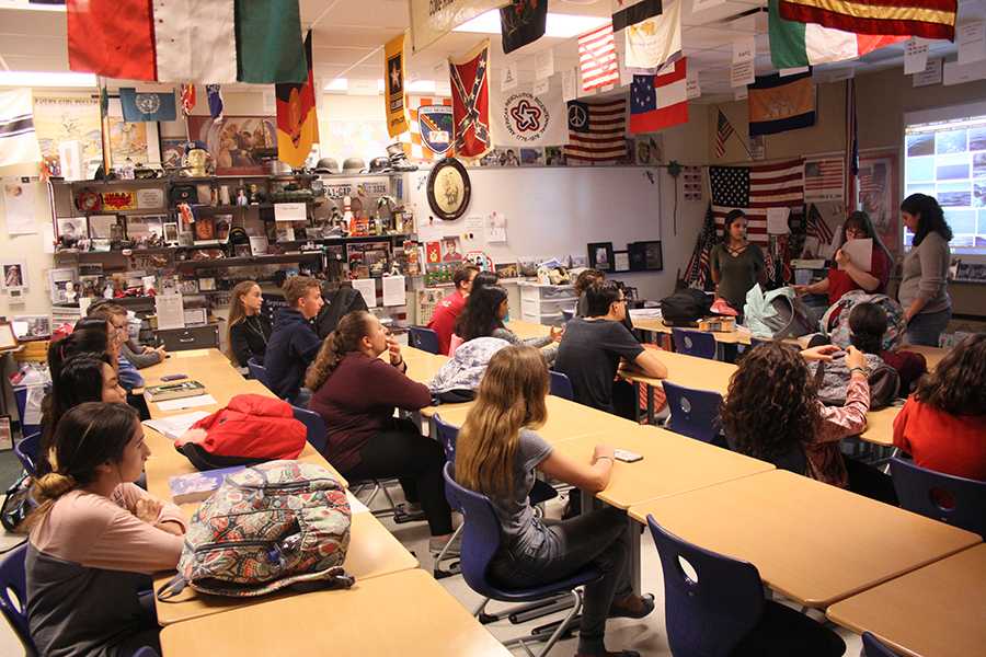 Students gather in Mr. Tom Clark’s, Social Studies, room for an Interact Club meeting. The meeting only lasted about twenty minutes.

