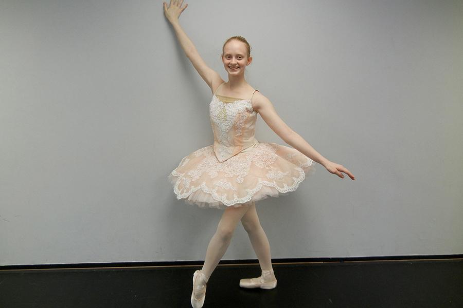 Amanda Willy (9) poses after rehearsing for her studio’s annual gala. Willy has been dancing since she was about five-years-old.
