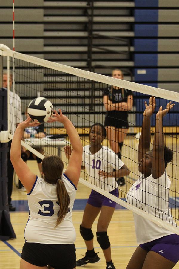 Jessica Toberman (10) sets the ball for one of her teammates to spike. She set up many balls for her teammates to spike. 