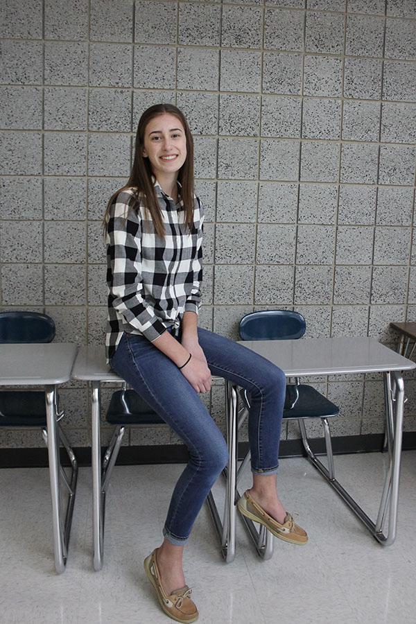 Claire D’Angelo (12) is posing for a picture in Lake Central. She has been one of Jehovah’s Witnesses all her life, and it is a very big part of her everyday life. 
