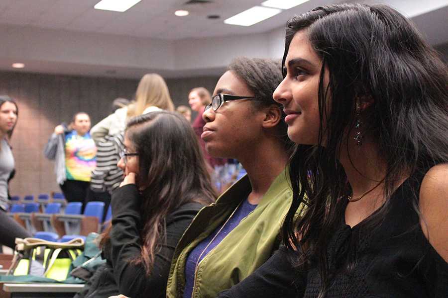 Sneha Shatish (12) and Ayanna Manyweather (12) listened to announcements. They were informed of upcoming events in history club. 