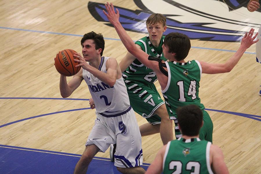 Brian Calligan (10) tries to put up a shot. The final score of the game was 38-31. 