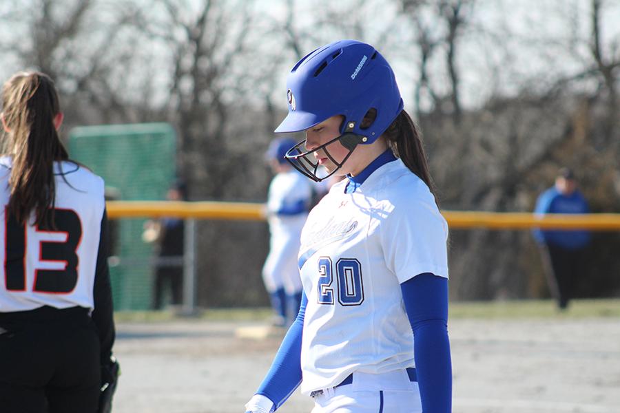 Kaitlyn Roethler (10) prepares before going to bat. She hit a foul ball.
