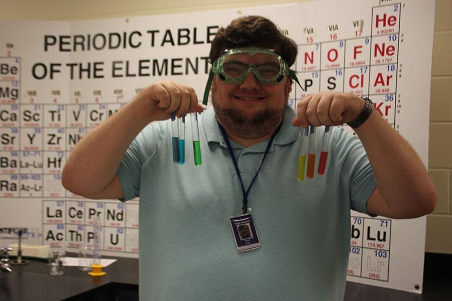 Mr. Dan Fox, Science, poses with lab equipment. Fox was a former student at Lake Central.