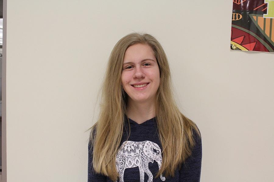  Kayla Longfield (10) poses for the camera near the auditorium. Longfield has been in theater for five years.