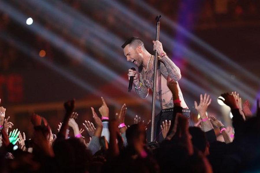 Maroon 5 singer Adam Levine performs during the Super Bowl LIII Halftime Show.  The performance was met with a lot of backlash from critics.