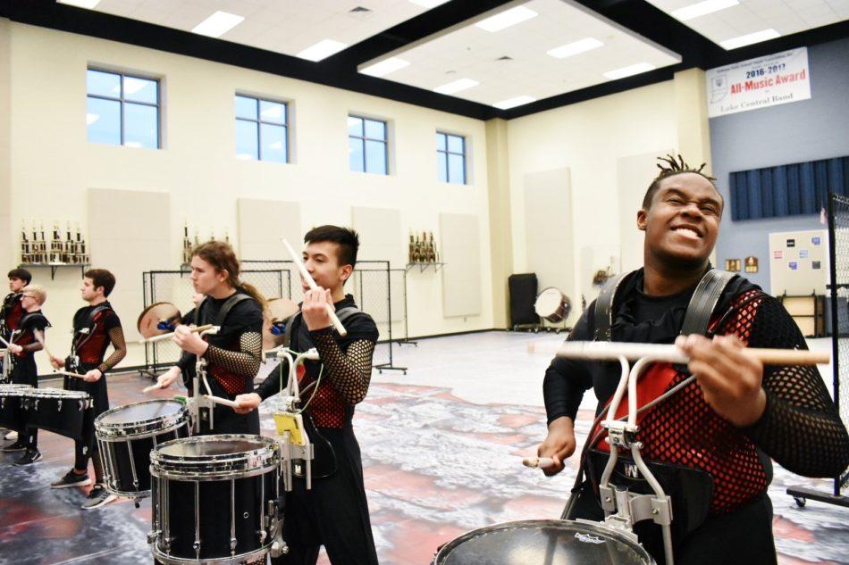 Snare line smiling at the end of one part of their show. They were smiling because this was the par of the show where they “broke free.”