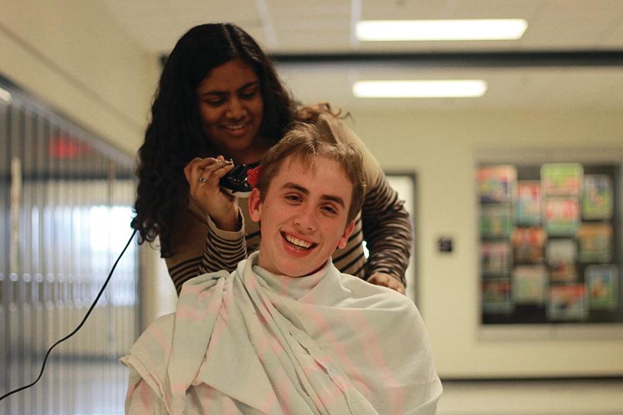 Nick Firlej (11) shaves his head for cancer. This was his second year shaving for change.