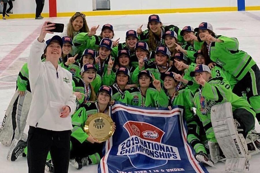 Vivian Cronin (9) and her hockey team pose for a selfie after winning the National Championship. Cronin and her team were overwhelmed with excitement.