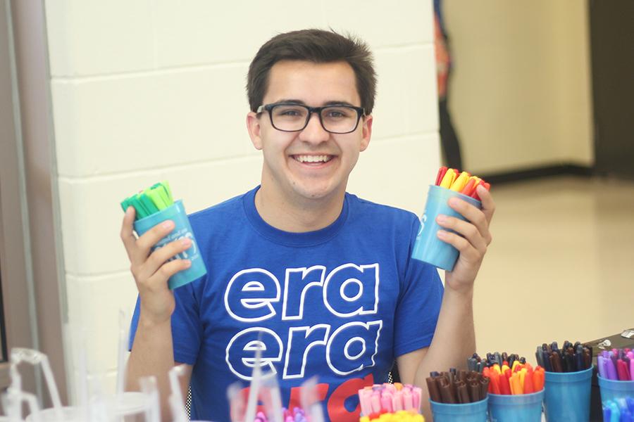 Kevin Holechko (12) smiles as he sells Sharpies. Holechko sold Sharpie markers and cups. Photo by: Camille Bereolos