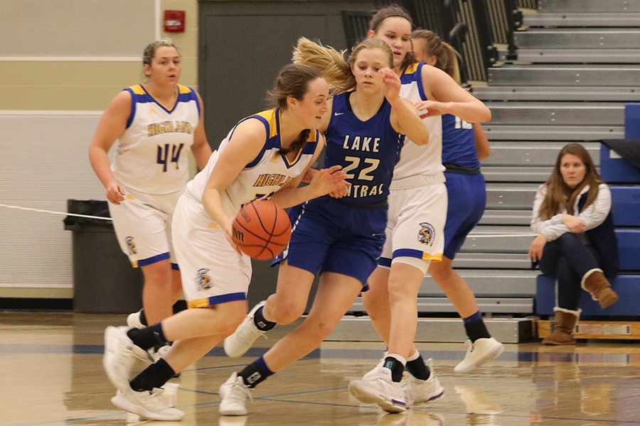 Amanda Blevins (11) moves in front of her opponent to try and intercept the ball. The final score was 42-34.