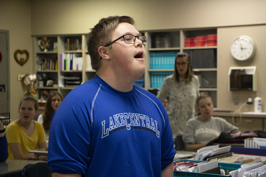 David Triesenburg (10) sings proudly to his Best Buddies members. After Triesenburg was done singing the group cheered loudly. 