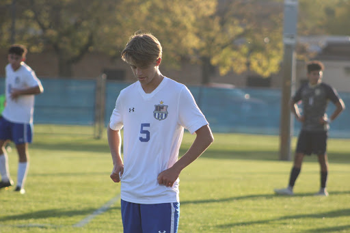 Sam Egnatz (11) takes a breath after a goal was made. Lake Central had just scored against Bishop Noll.