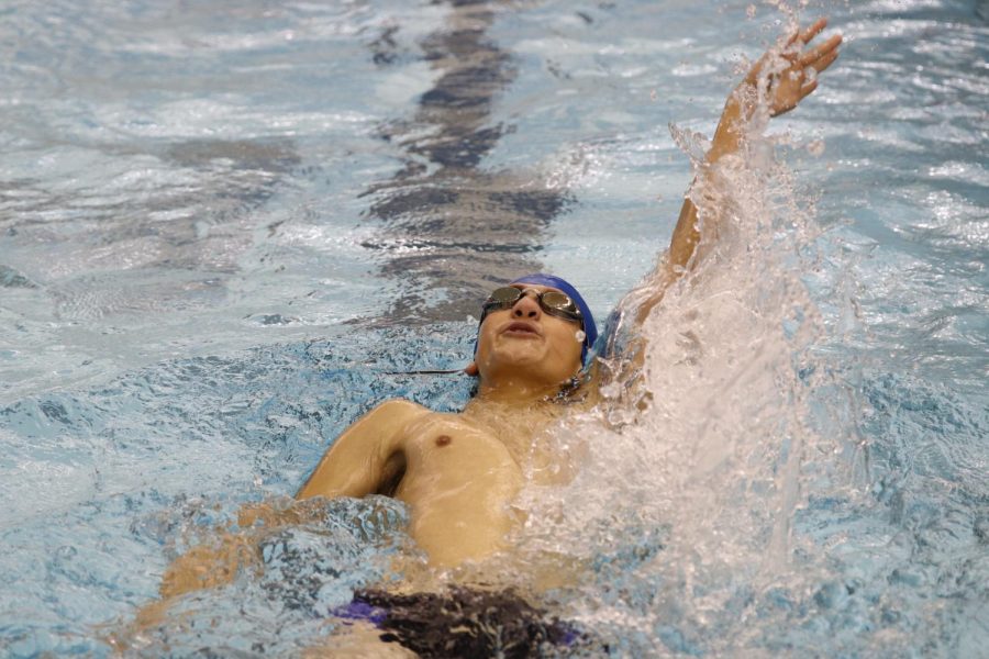 Ethan Schassburger (11) swims in the 100 meter backstroke. This was Ethan’s first swim meet on the Lake Central team.