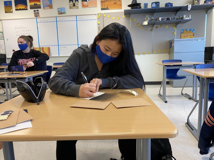Kimberly Hesterman (11) focuses on putting detail into her card. As president of the Junior Class Cabinet she wanted to make teacher appreciation run as smoothly as possible.