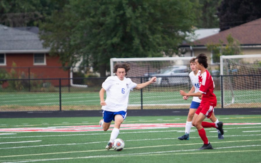 Noah Pettit (9) drives towards the ball. The team was defeated by Munster 3-0. 
