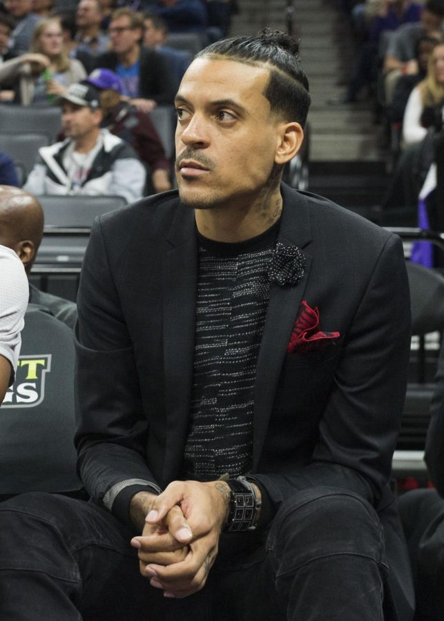 This would the type of suit people would wear at homecoming. Matt Barnes sits on the bench in street clothes during a game at Golden 1 Center in Sacramento, California.
