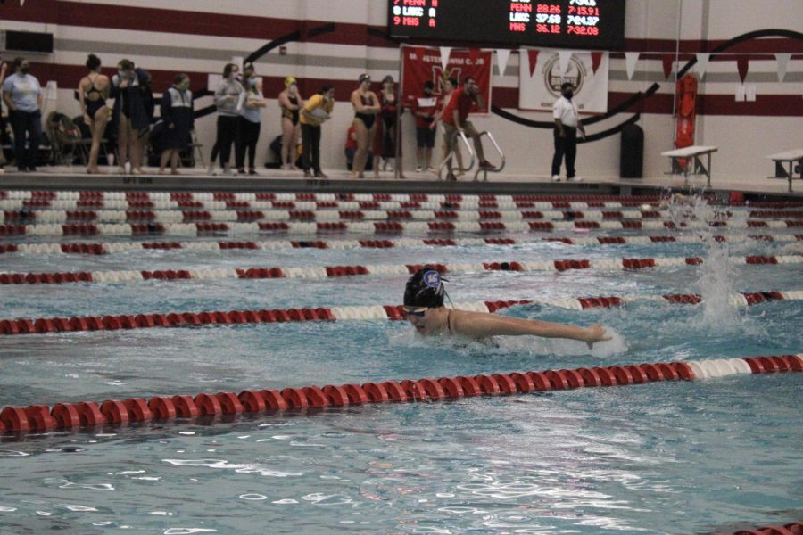 Anna Kabrud (10) competes in the 800 Medley Relay. In the 800 Medley Relay, each swimmer completes a 200 IM. 
