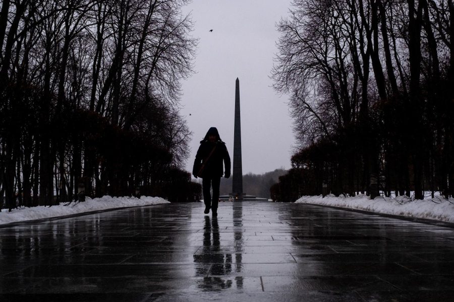 A man walks in front of the Monument to the Unknown Soldier on Friday, Jan. 28, 2022, in Kyiv, Ukraine. International fears of an imminent Russian military invasion of Ukraine continue to remain high as Russian troops mass along the Russian-Ukrainian border and diplomatic talks continue to plod along. (Chris McGrath/Getty Images/TNS)