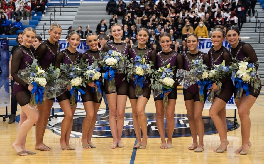 Senior+Centralettes+hold+flowers+after+their+competition.+During+the+Lake+Central+Dance+Invitational%2C+they+had+three+first+place+finishes+in+Jazz%2C+Pom%2C+and+Hip+Hop.+Photo+by%3A+Kayla+Oberholtzer+