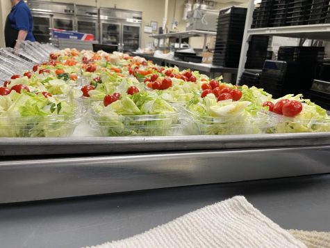 The cafeteria staff prepares lunches for students daily. On average they served 1,600 to 1,700 students a day.