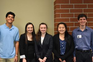 George Dous (12), Megan Duffy, Kathedra Csanyi (12), Kimberly Hesterman (12) and John Hemmerling pose for a group photo before the event. Hemmerling and Duffy were two of the speakers, the other two were on Google Meet0.