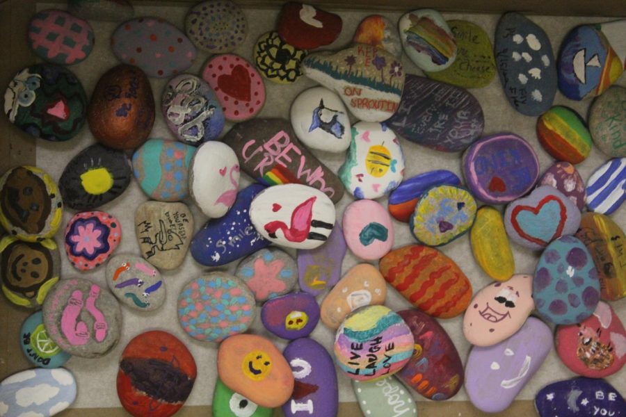N-Teens paints inspirational rocks at the beginning of every year. The finished rocks are then placed in Lake Central’s rock garden outside.