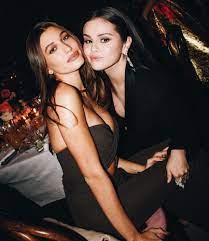 (Photo from Getty Images) Hailey Bieber and Selena Gomez are posing a selfie together during the 2022 Golden Globe Awards. This was before the “feud “ between them happened.