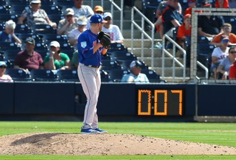 In this photo from March 11, 2019, Eric Hanhold (70) of the New York Mets gets set to deliver a pitch as the pitch clock counts down during the ninth inning of a spring training baseball game against the Houston Astros at Fitteam Ballpark of the Palm Beaches in West Palm Beach, Florida. (Rich Schultz/Getty Images/TNS)