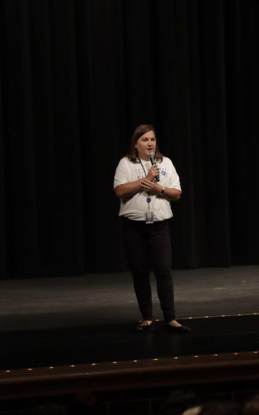 Welcoming the new freshman, Mrs. Erin Novak, Head Principal, talks about what they will be doing for the day. She passed the microphone to Mr. Todd Smolinski, Assistant Principal.