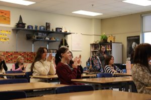 Junior class cabinet members clapping after Taylor Borrowski (11) finished her speech. She ran for and received the position of vice president. 