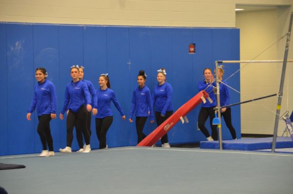 Before their meet on January 29, the girls gymnastics team is introduced to the spectators. The girls faced Michigan City. 
