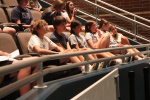 While sitting in the auditorium, incoming freshmen listen intently to the presentation about how the school year would go regarding expectations. Mrs. Ashley Klein, head counselor, Mrs. Erin Novak, principal and Lily Collard (12), MAP (Mentorship Ambassador Program) president, mostly spoke. 